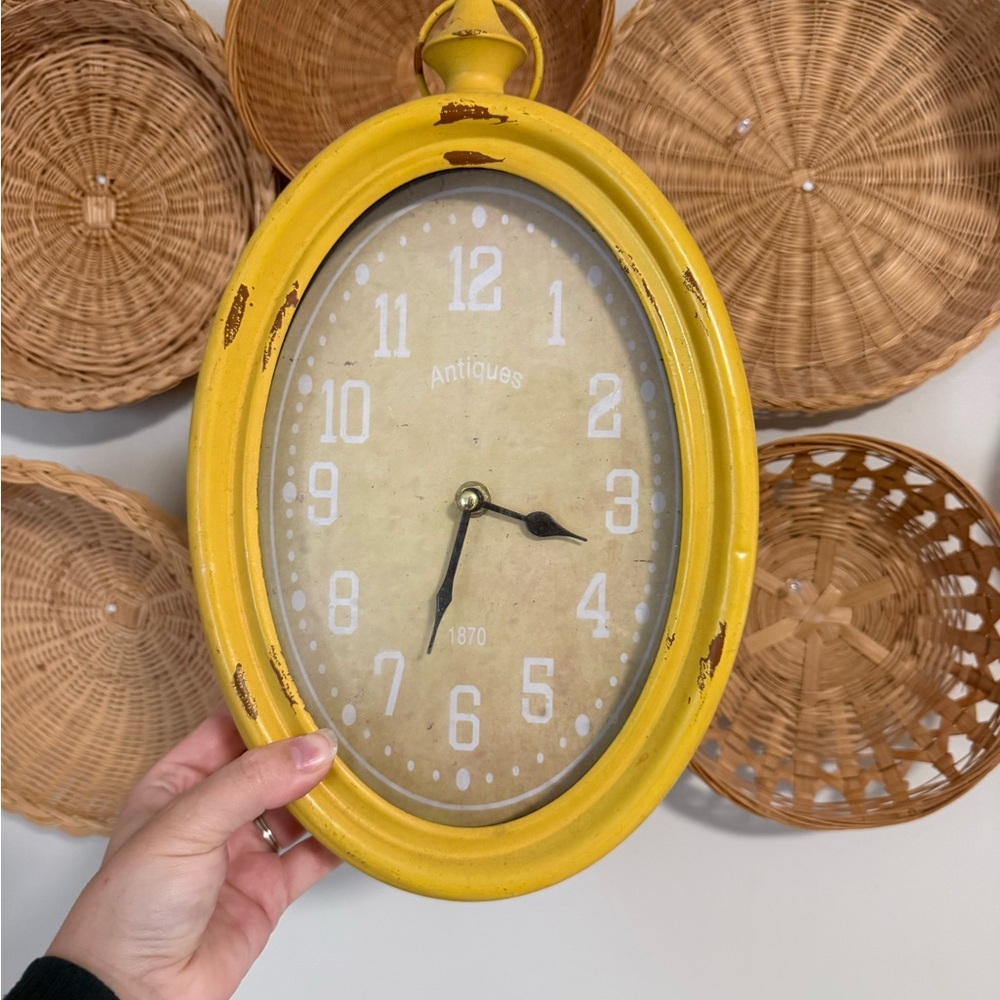 Antique Yellow Oval Wall Clock with Distressed Finish